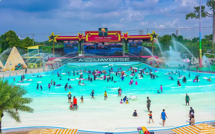 People enjoying Aquaverse Mega Wave Pool at Columbia Pictures Aquaverse in Pattaya